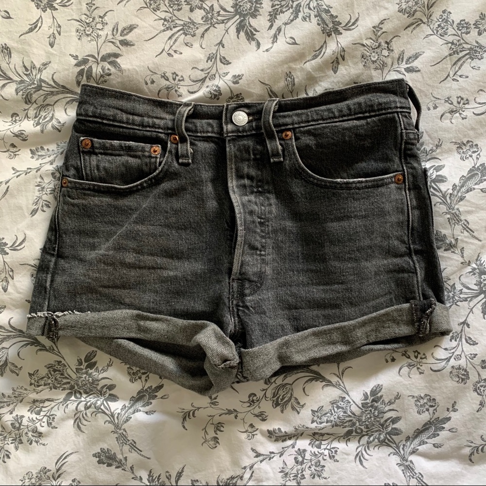 LEVIS | black cut offs with button fly